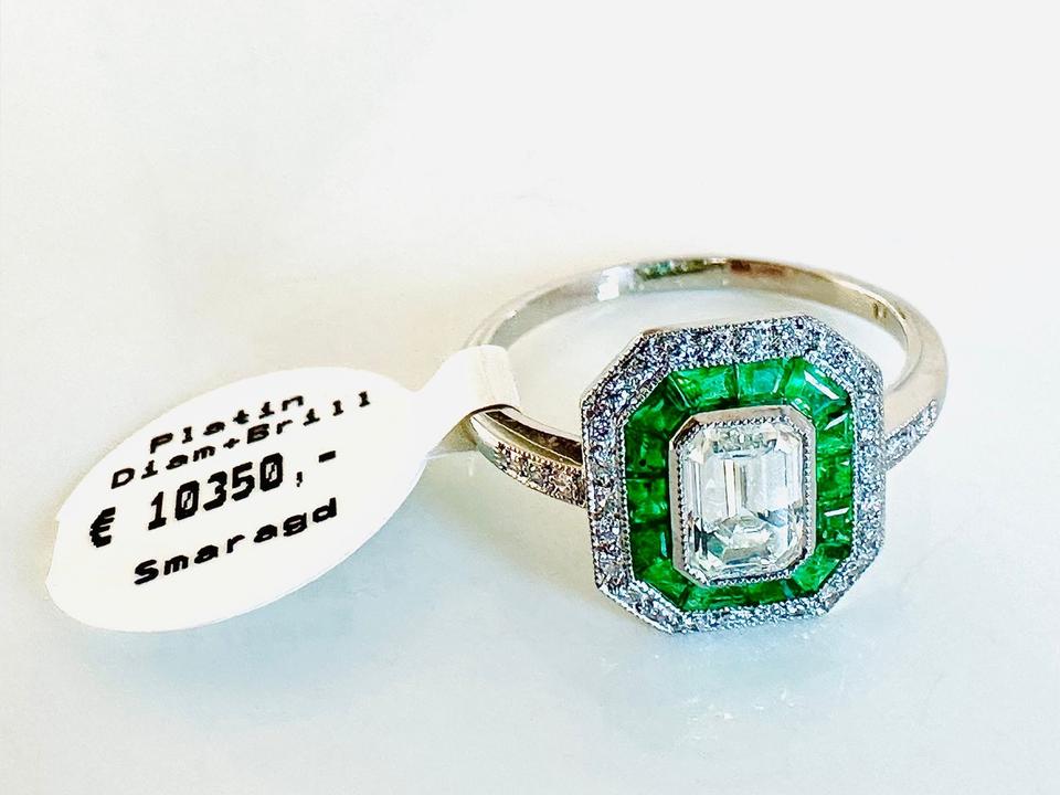 Platinring mit Smaragd und Diamant ca: 1,0 ct getönt,weiß vsi